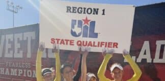 Four young female athletes in yellow tops and white skirts raise a UIL State Qualifier banner, wearing gold medals after a competition win.
