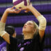 1K6A4422 | Press Pass Sports Female volleyball player with beige arm sleeves reaching up to touch a purple-and-white ball near the net.