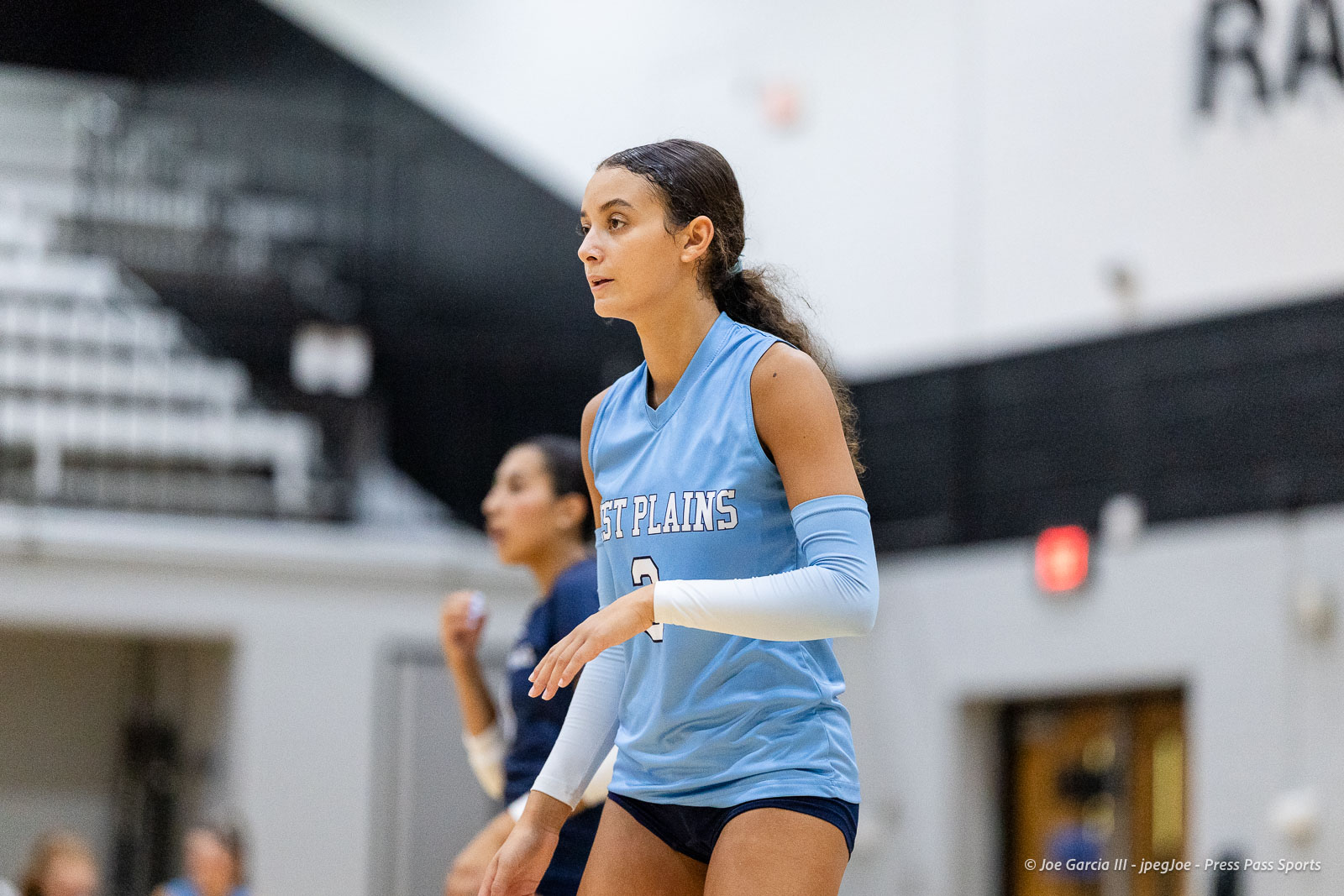 randall-showcase-2026-jpegJoe-pps-21 | Press Pass Sports Female basketball player in a light blue jersey with number 3, standing on an indoor court during a game.