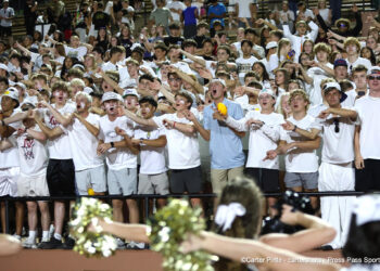 20260828-AmarilloHigh-PaloDuro-FB-038 | Press Pass Sports Large group of students in white shirts cheering with arms raised at a stadium crowd.