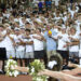 20260828-AmarilloHigh-PaloDuro-FB-038 | Press Pass Sports Large group of students in white shirts cheering with arms raised at a stadium crowd.