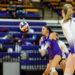 herford-vs-canyon-volleyball-jpegJoe-pps-19 | Press Pass Sports A female volleyball player in a purple uniform crouches with arms extended to pass a ball during a rally in an indoor gym, with teammates and spectators in the bleachers behind.